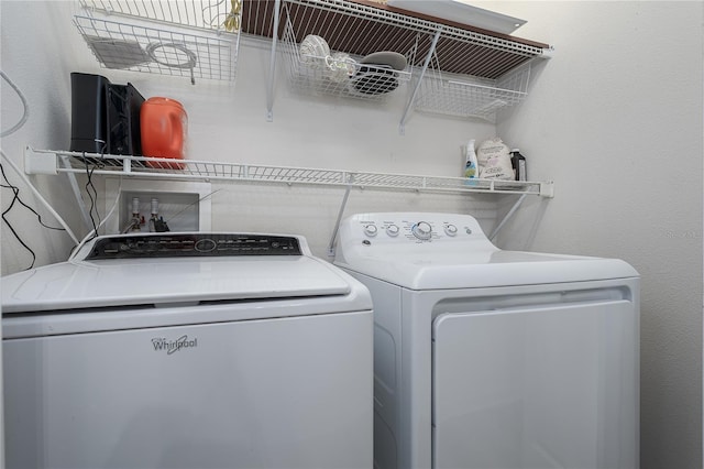 11558 84th Street Cir E Unit 106, Parrish, FL 34219 - washroom featuring washer and dryer