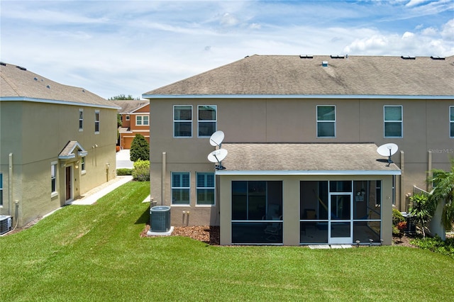 11558 84th Street Cir E Unit 106, Parrish, FL 34219 - back of property with roof with shingles, a yard, and a sunroom