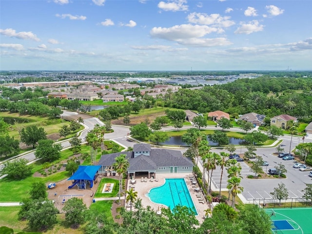 11558 84th Street Cir E Unit 106, Parrish, FL 34219 - aerial view of residential area featuring a pool area and a large body of water