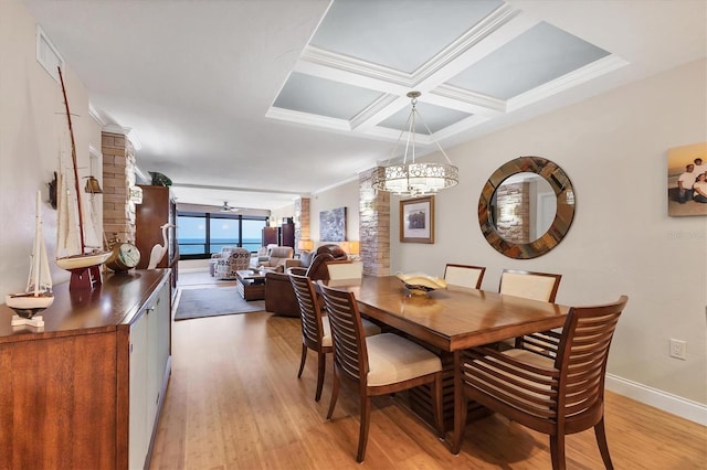 840 The Esplanade N Unit 805, Venice, FL 34285 - dining space featuring light wood-style floors, coffered ceiling, ornate columns, beam ceiling, and crown molding