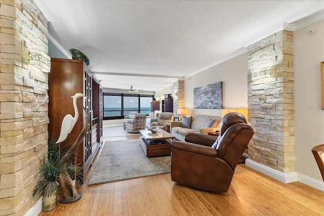 840 The Esplanade N Unit 805, Venice, FL 34285 - living room featuring wood finished floors, crown molding, and ceiling fan