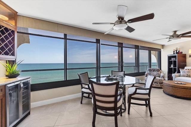 840 The Esplanade N Unit 805, Venice, FL 34285 - sunroom with wine cooler and a water view
