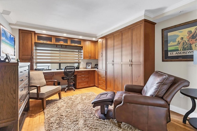 840 The Esplanade N Unit 805, Venice, FL 34285 - office area featuring light wood-style flooring, built in study area, recessed lighting, and crown molding