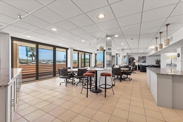 840 The Esplanade N Unit 805, Venice, FL 34285 - dining space with light tile patterned flooring and recessed lighting