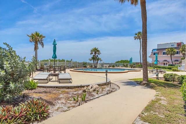 840 The Esplanade N Unit 805, Venice, FL 34285 - community pool featuring a patio