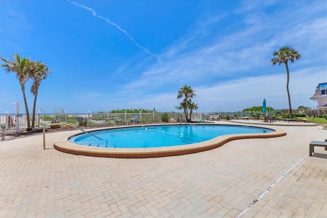 840 The Esplanade N Unit 805, Venice, FL 34285 - community pool featuring a patio area