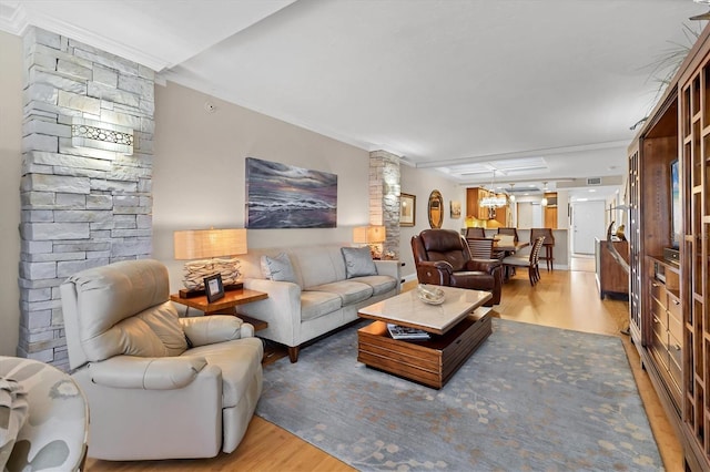 840 The Esplanade N Unit 805, Venice, FL 34285 - living room with wood finished floors and ornamental molding