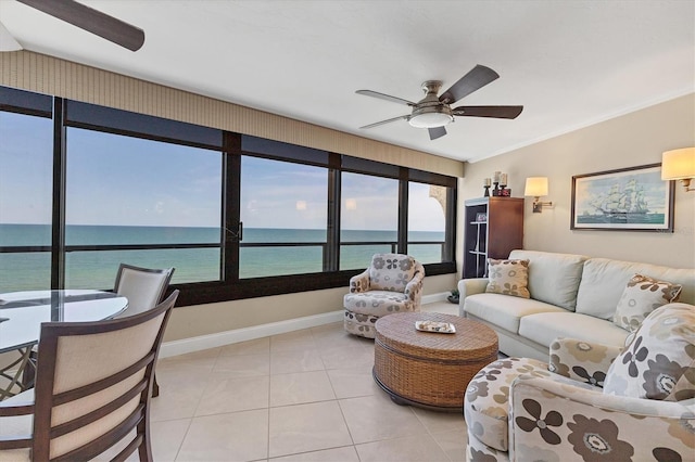 840 The Esplanade N Unit 805, Venice, FL 34285 - living area with a ceiling fan, a water view, light tile patterned flooring, and ornamental molding