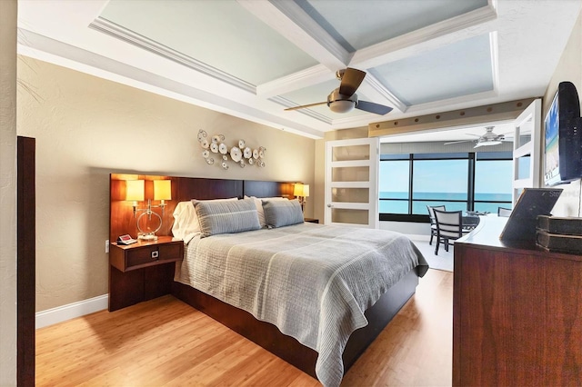 840 The Esplanade N Unit 805, Venice, FL 34285 - bedroom with light wood-style floors, coffered ceiling, beam ceiling, crown molding, and ceiling fan