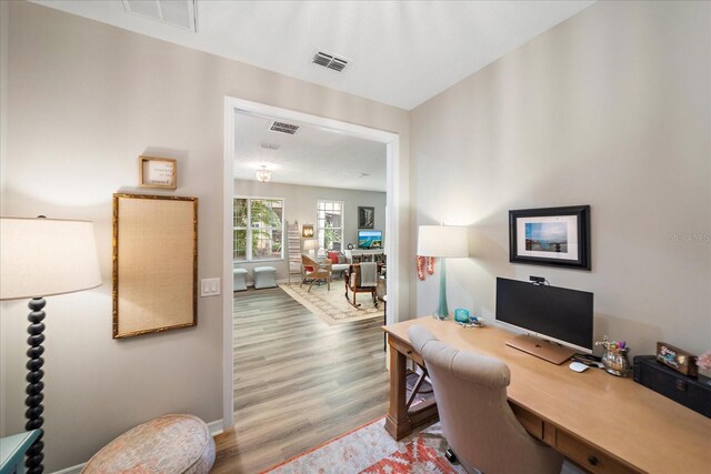 5427 Napa Dr, Sarasota, FL 34243 - home office featuring wood finished floors and baseboards