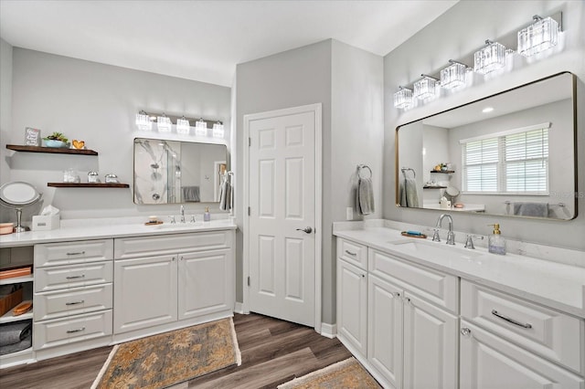 5427 Napa Dr, Sarasota, FL 34243 - full bath featuring wood finished floors and two vanities