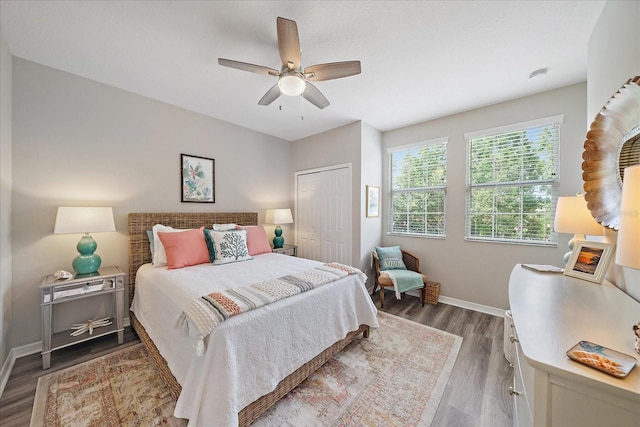 5427 Napa Dr, Sarasota, FL 34243 - bedroom with wood finished floors, a closet, and ceiling fan