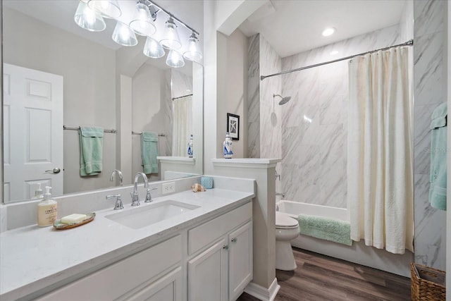 5427 Napa Dr, Sarasota, FL 34243 - bathroom with vanity, shower / bath combo with shower curtain, and wood finished floors