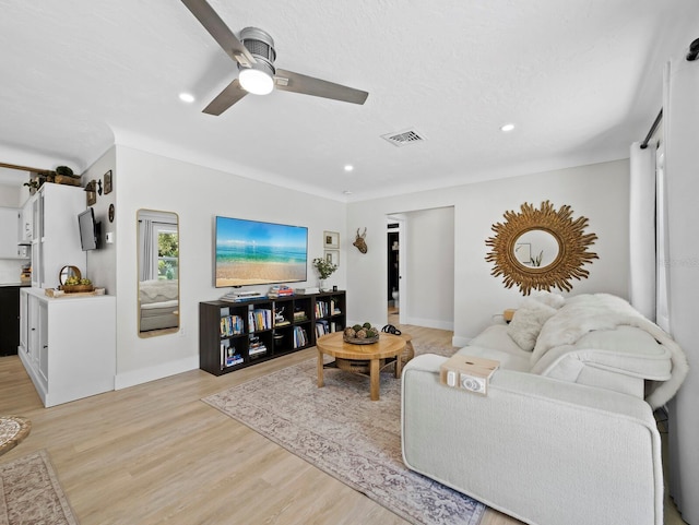 3439 Fair Oaks Pl, Sarasota, FL 34239 - living area with a ceiling fan, light wood-style floors, and recessed lighting