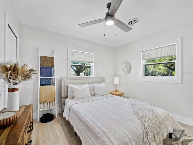 3439 Fair Oaks Pl, Sarasota, FL 34239 - bedroom featuring light wood-style floors and ceiling fan