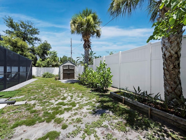 3439 Fair Oaks Pl, Sarasota, FL 34239 - fenced backyard with a storage shed and glass enclosure