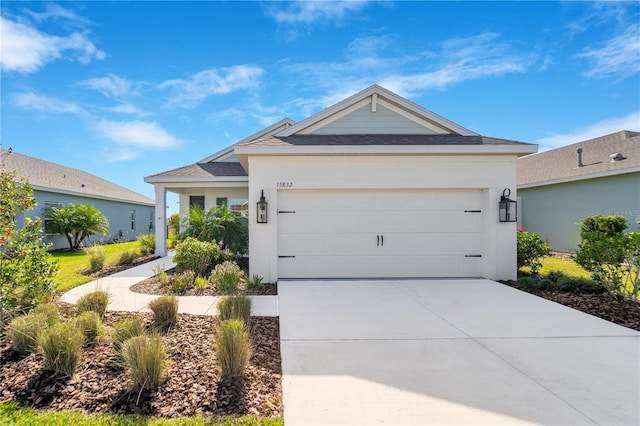 13832 Old Creek Ct, Parrish, FL 34219 - single story home with concrete driveway, an attached garage, a shingled roof, and stucco siding