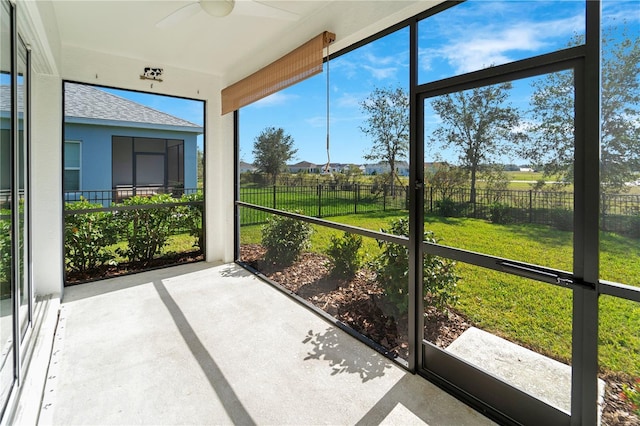13832 Old Creek Ct, Parrish, FL 34219 - unfurnished sunroom featuring a ceiling fan