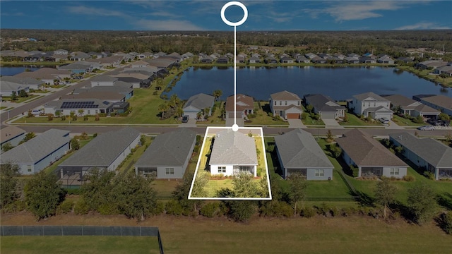 13832 Old Creek Ct, Parrish, FL 34219 - aerial view of residential area featuring property boundaries highlighted and a nearby body of water