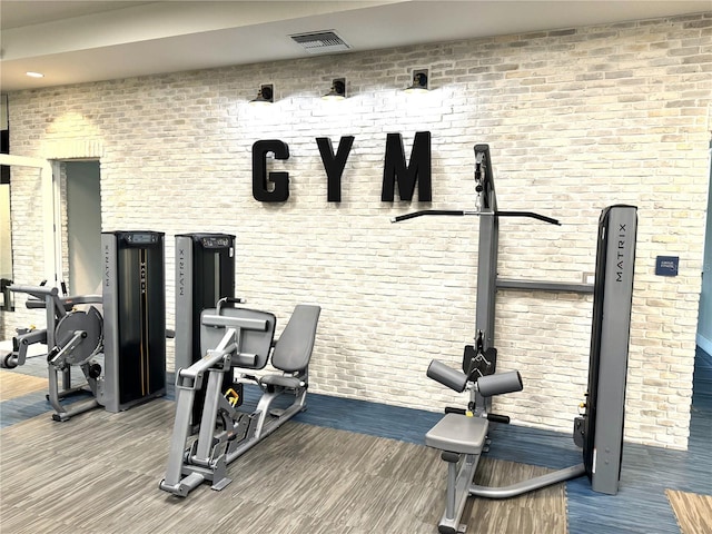 13832 Old Creek Ct, Parrish, FL 34219 - exercise room featuring wood finished floors
