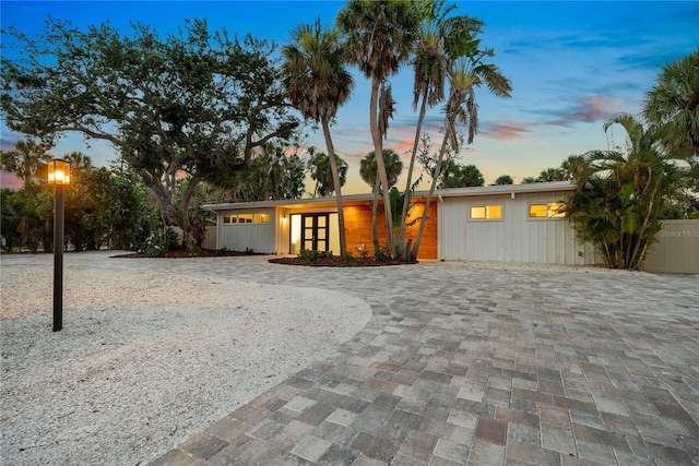 4879 Commonwealth Dr, Sarasota, FL 34242 - mid-century modern home featuring decorative driveway