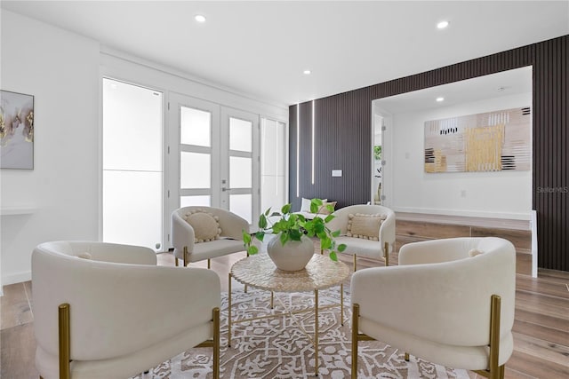 4879 Commonwealth Dr, Sarasota, FL 34242 - living area with french doors, wood finished floors, and recessed lighting
