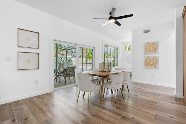 4879 Commonwealth Dr, Sarasota, FL 34242 - dining area with ceiling fan and light wood finished floors