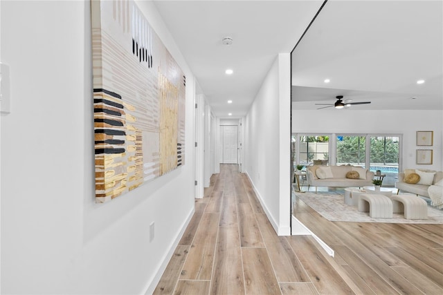 4879 Commonwealth Dr, Sarasota, FL 34242 - corridor with recessed lighting and light wood-style floors