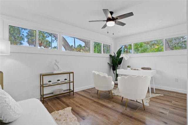 4879 Commonwealth Dr, Sarasota, FL 34242 - dining room featuring wood finished floors and a ceiling fan