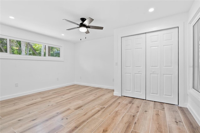4879 Commonwealth Dr, Sarasota, FL 34242 - unfurnished bedroom featuring light wood-style floors, recessed lighting, a closet, and ceiling fan