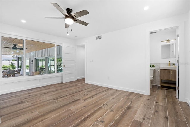 4879 Commonwealth Dr, Sarasota, FL 34242 - unfurnished room featuring ceiling fan, wood finished floors, and recessed lighting