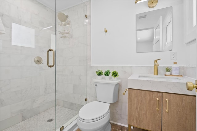 4879 Commonwealth Dr, Sarasota, FL 34242 - full bathroom featuring vanity, a tile shower, tile walls, and a wainscoted wall
