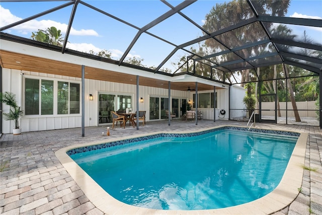 4879 Commonwealth Dr, Sarasota, FL 34242 - swimming pool with a patio, a ceiling fan, and a lanai