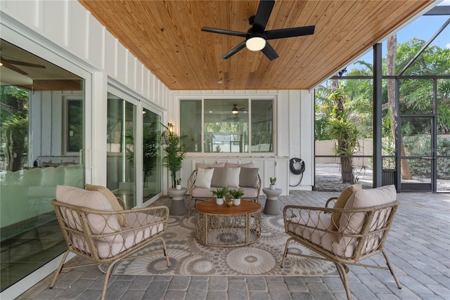 4879 Commonwealth Dr, Sarasota, FL 34242 - sunroom featuring a ceiling fan and outdoor lounge area