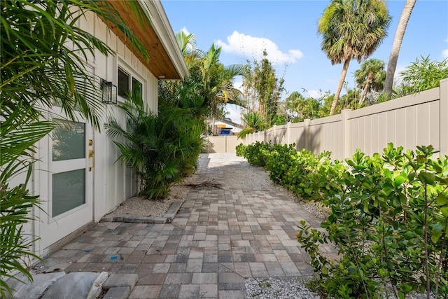 4879 Commonwealth Dr, Sarasota, FL 34242 - fenced backyard featuring a patio