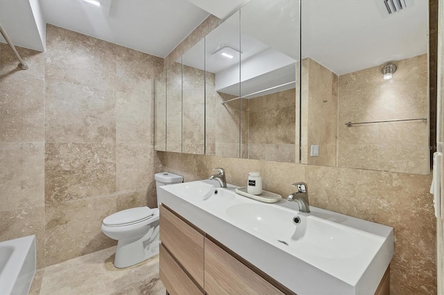 4116 61st Avenue Terrace W, Bradenton, FL 34210 - bathroom featuring tile walls and double vanity