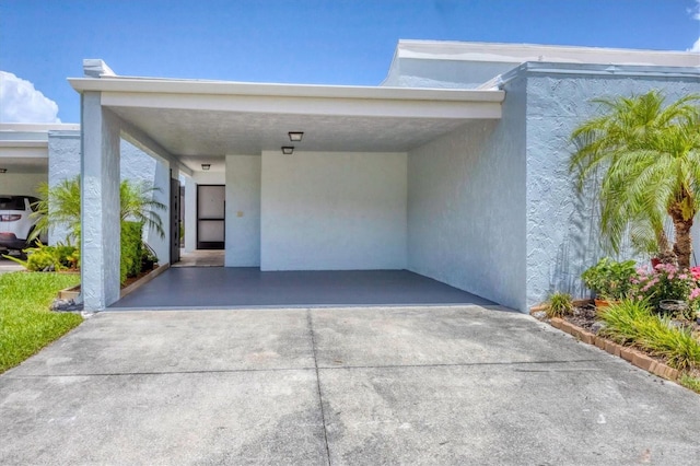 4116 61st Avenue Terrace W, Bradenton, FL 34210 - view of front of house featuring concrete driveway and stucco siding
