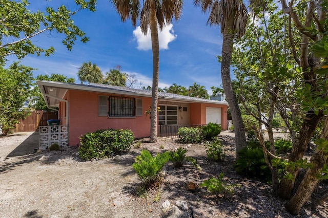 212 71st St, Holmes Beach, FL 34217 - single story home featuring a garage and concrete block siding