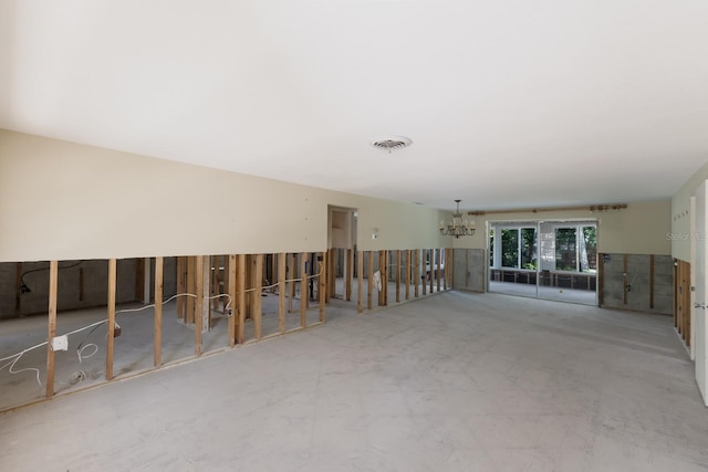 212 71st St, Holmes Beach, FL 34217 - spare room with a chandelier