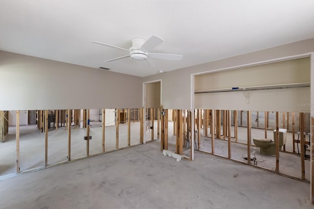 212 71st St, Holmes Beach, FL 34217 - unfurnished bedroom with a closet, concrete flooring, and ceiling fan