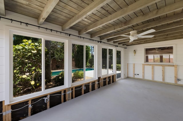 212 71st St, Holmes Beach, FL 34217 - unfurnished sunroom with ceiling fan and beamed ceiling