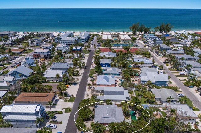 212 71st St, Holmes Beach, FL 34217 - aerial view of property's location with a nearby body of water and nearby suburban area