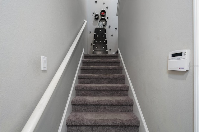 11562 84th Street Cir E Unit 103, Parrish, FL 34219 - stairway featuring baseboards