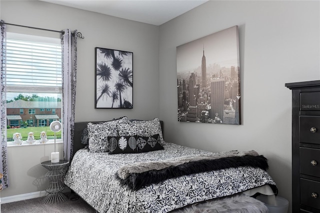 11562 84th Street Cir E Unit 103, Parrish, FL 34219 - carpeted bedroom featuring baseboards