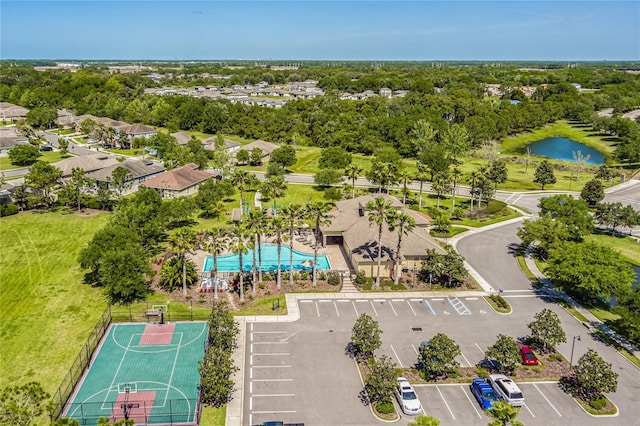 11562 84th Street Cir E Unit 103, Parrish, FL 34219 - bird's eye view of a pool area and a nearby body of water