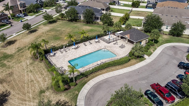 11562 84th Street Cir E Unit 103, Parrish, FL 34219 - aerial perspective of suburban area with a pool