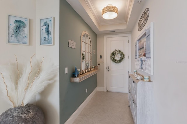 130 Riviera Dunes Way Unit 601, Palmetto, FL 34221 - entrance foyer featuring a raised ceiling, crown molding, and light tile patterned floors