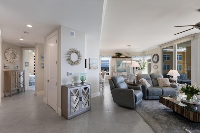130 Riviera Dunes Way Unit 601, Palmetto, FL 34221 - living area featuring a ceiling fan, light tile patterned flooring, and recessed lighting