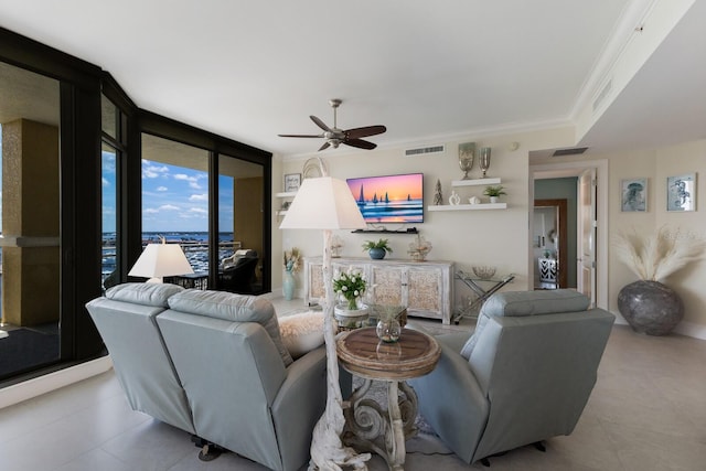 130 Riviera Dunes Way Unit 601, Palmetto, FL 34221 - living room featuring ceiling fan, light tile patterned floors, and ornamental molding