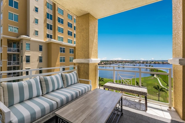 130 Riviera Dunes Way Unit 601, Palmetto, FL 34221 - balcony featuring a water view and outdoor lounge area